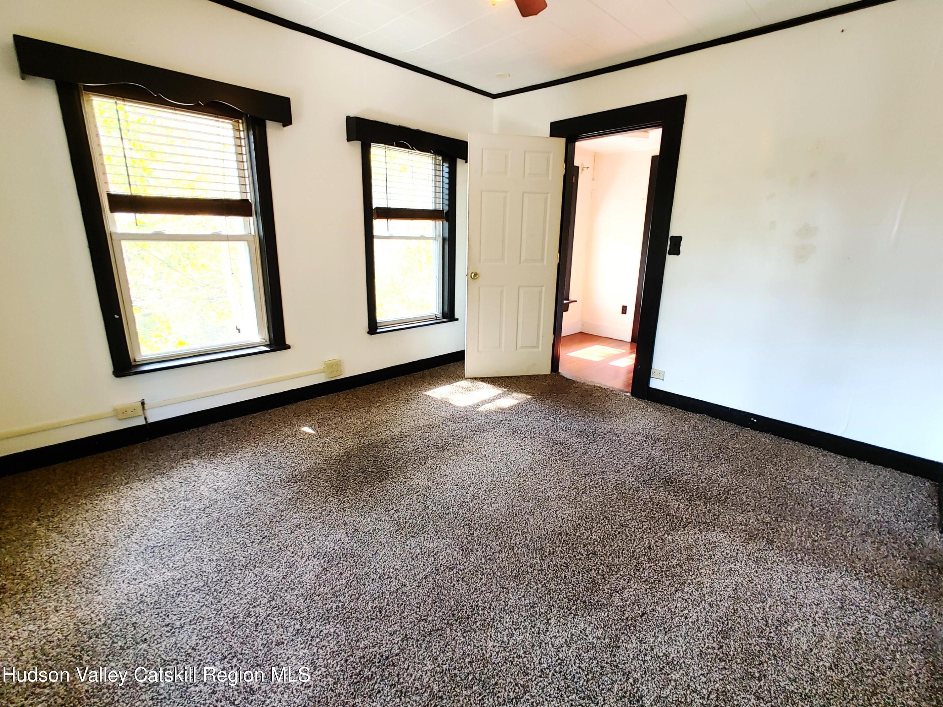 11 Old Turnpike Road Pine Hill, NY 12465 - Photo 10 of 64 an empty room with windows and closet