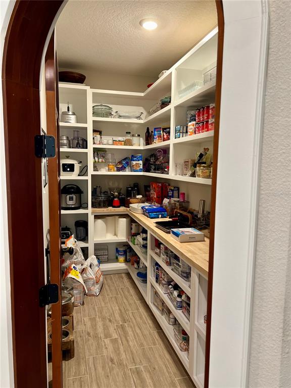 1266 Spotted Sandpiper Loop Winter Springs, FL 32708 - Photo 16 of 21 a view of a kitchen with fridge and rack