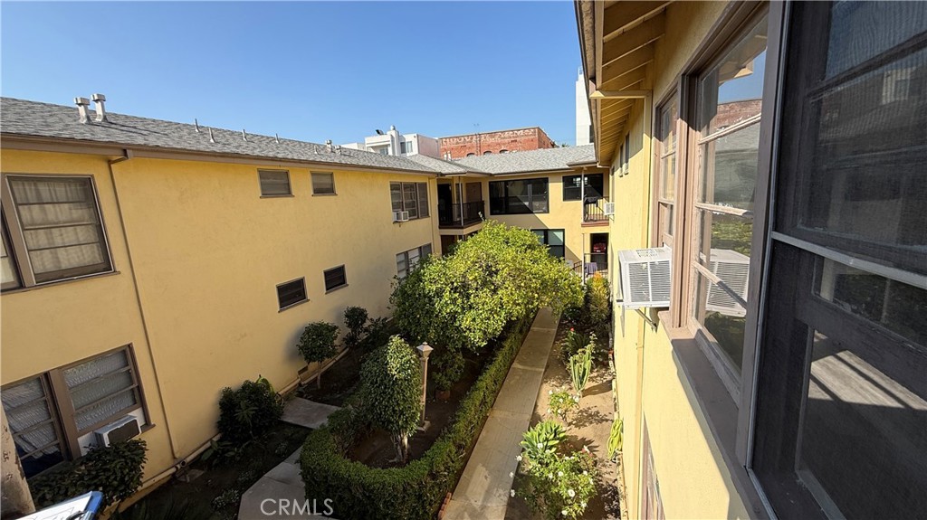 337 South Occidental Boulevard, Unit 5 Los Angeles, CA 90057 - Photo 2 of 16 a front view of a house with a yard