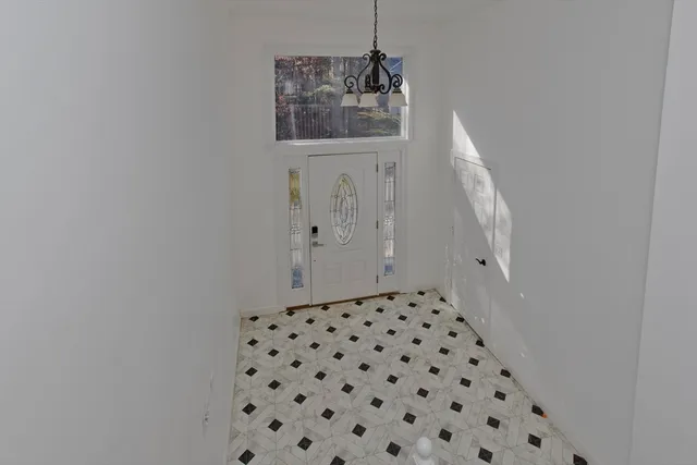 a bathroom with a shower and a sink