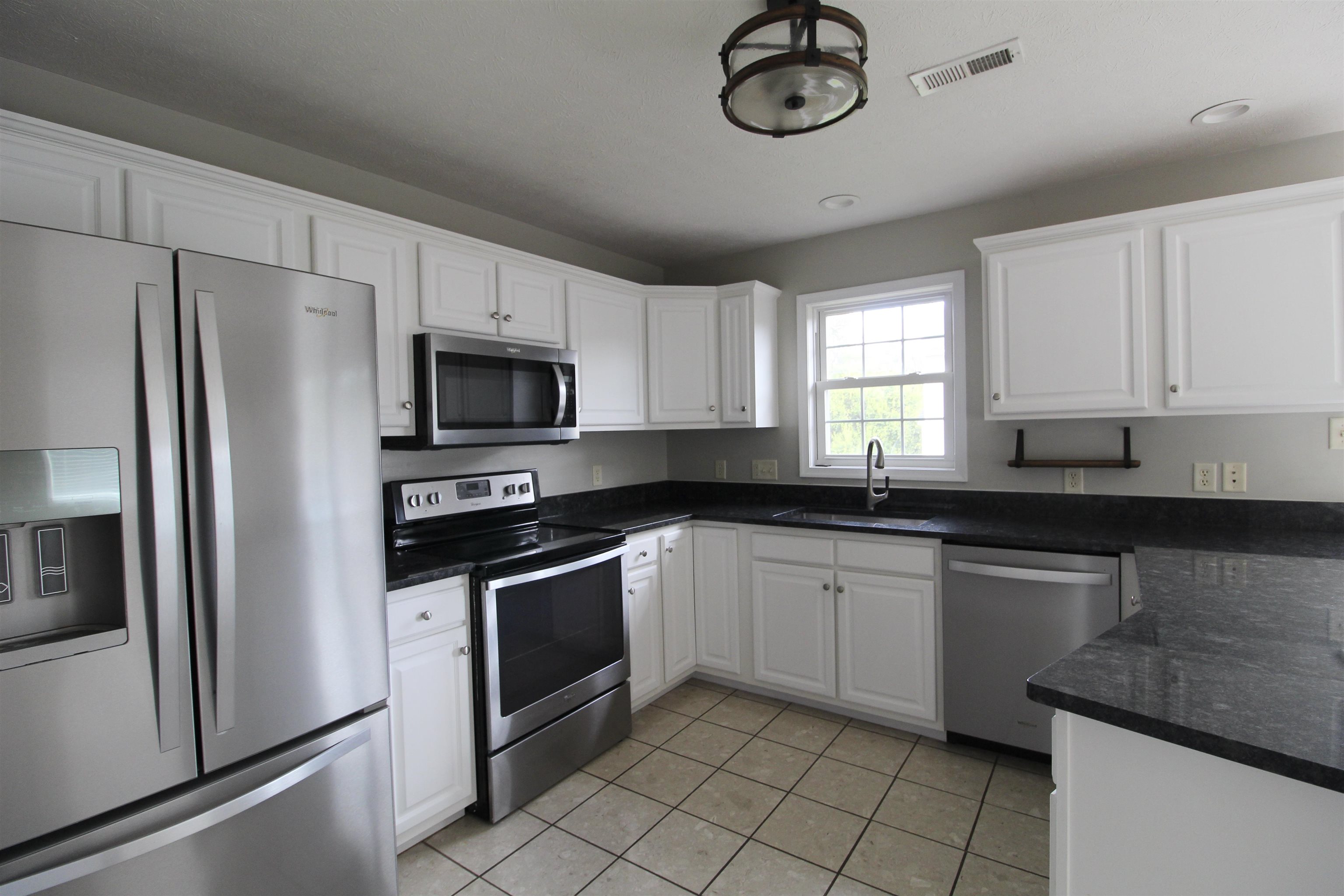 2881 Taylor Spring Lane Harrisonburg, VA 22801 - Photo 2 of 13 a kitchen with cabinets stainless steel appliances and a counter space