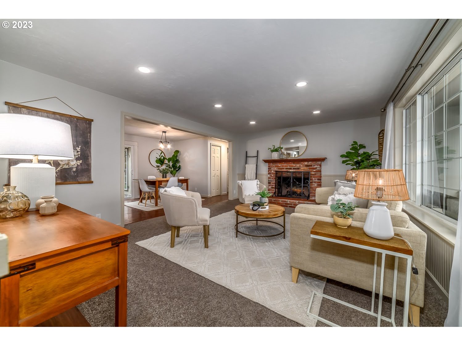 2732 20th Street Springfield, OR 97477 - Photo 5 of 31 a living room with fireplace furniture and a wooden floor