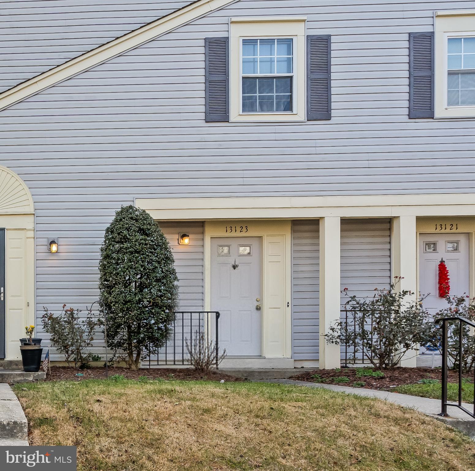 13123 Conductor Way, Unit 243 Silver Spring, MD 20904 - Photo 1 of 1 a front view of a house with garden