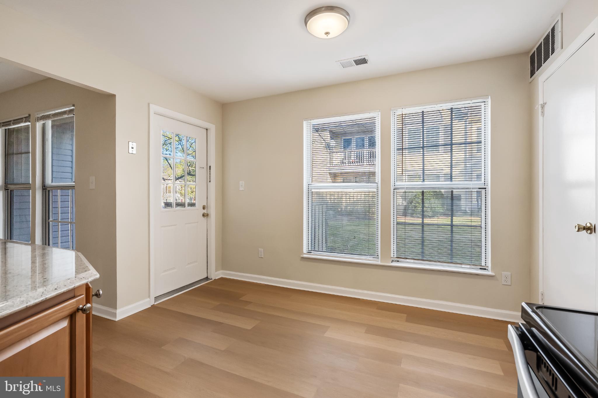 13123 Conductor Way, Unit 243 Silver Spring, MD 20904 - Photo 7 of 17 Breakfast nook leading to private patio