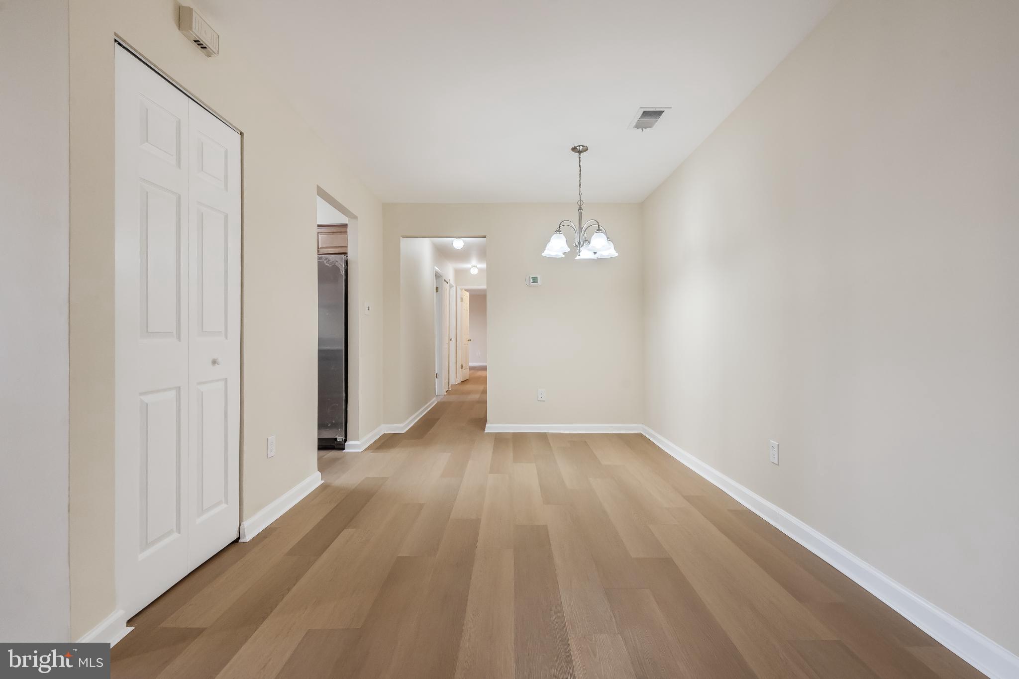 13123 Conductor Way, Unit 243 Silver Spring, MD 20904 - Photo 10 of 17 Spacious Dining Room with warm wood flooring.