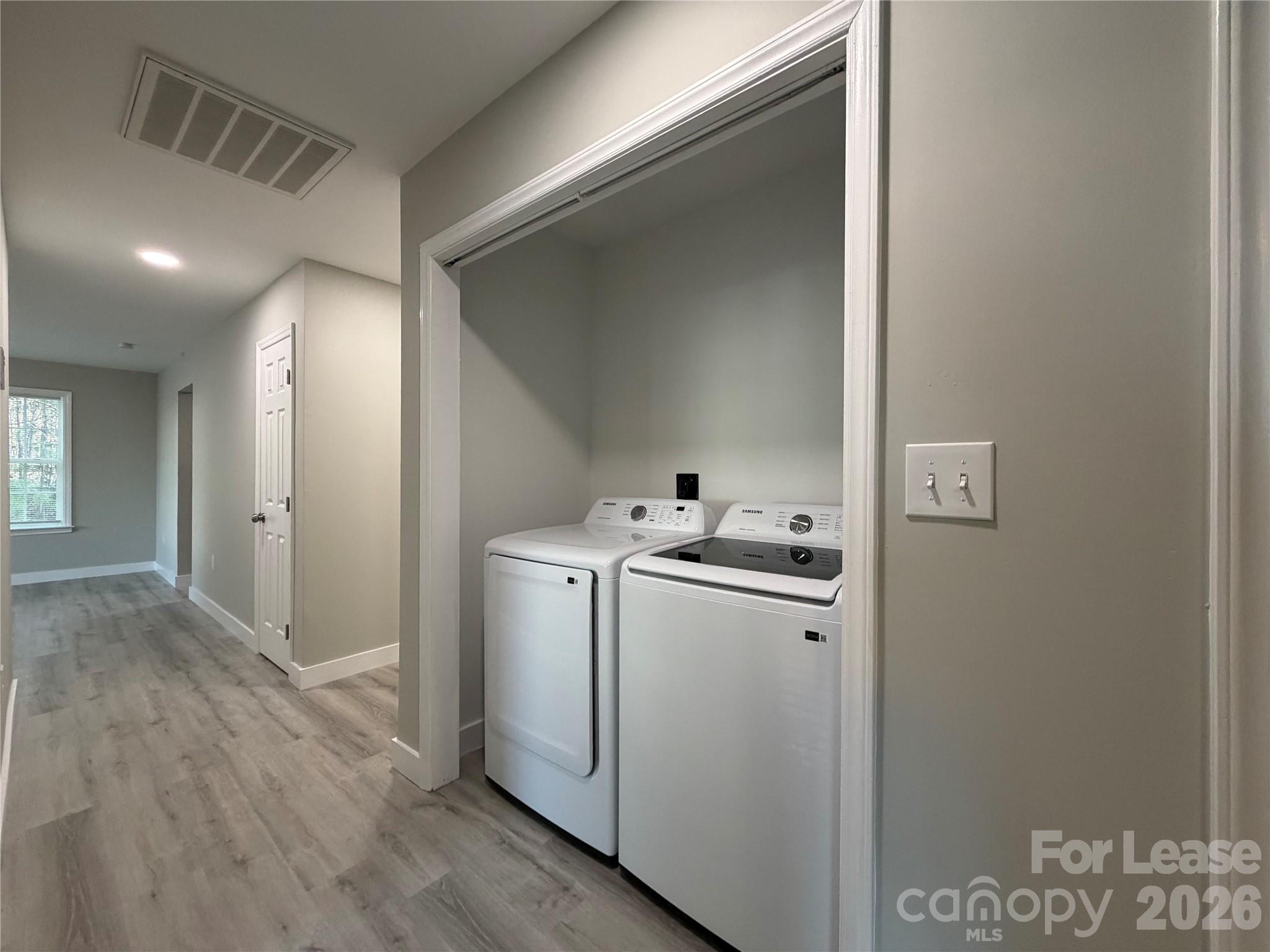 3134 Rainbow Ridge Drive Matthews, NC 28105 - Photo 6 of 12 a view of utility room with washer and dryer