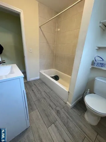 a bathroom with a sink and a toilet