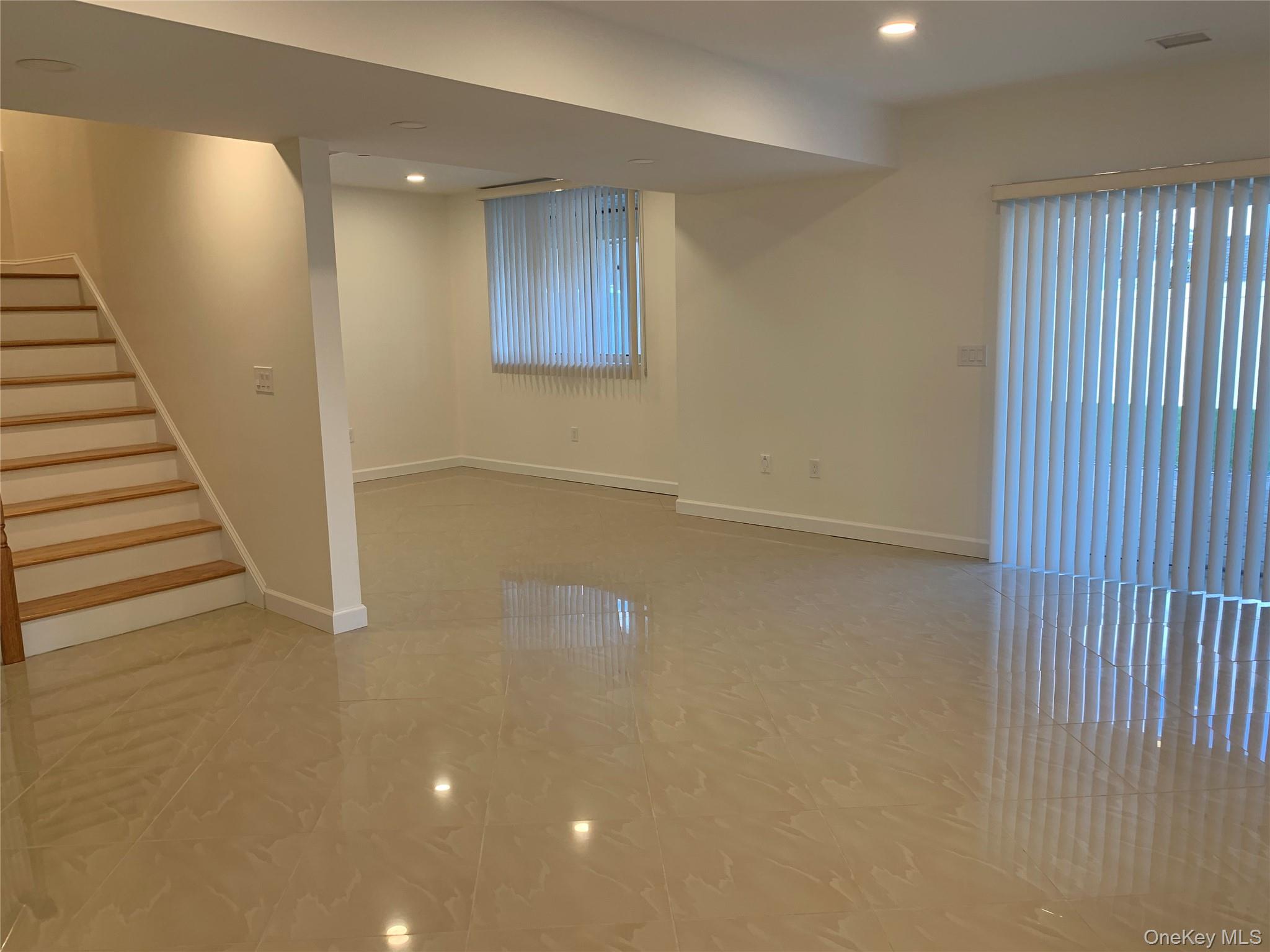 97 Gainsborg Avenue East, Unit RIGHT SIDE West Harrison, NY 10604 - Photo 22 of 39 Amazing lower level, it’s huge had sliders out to covered patio and full bath and private entrance