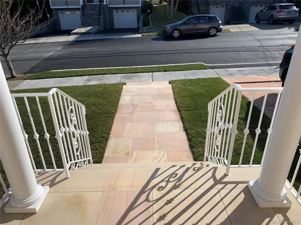a view of backyard with seating area