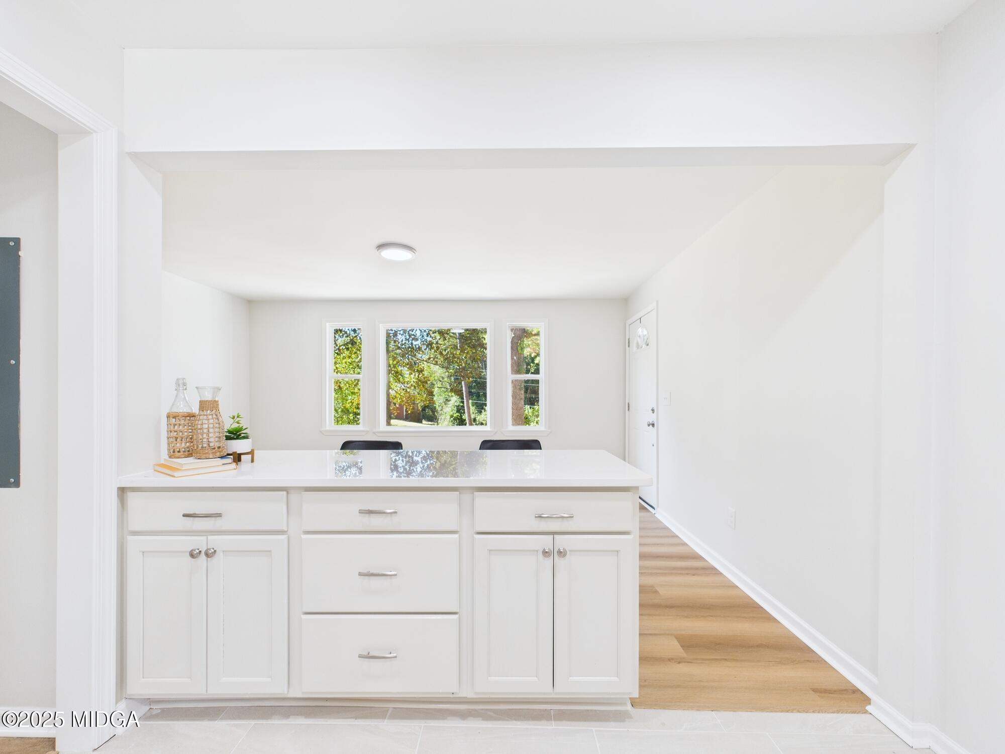 2471 Old Holton Road Macon, GA 31204 - Photo 12 of 34 a room with a sink cabinets and a window