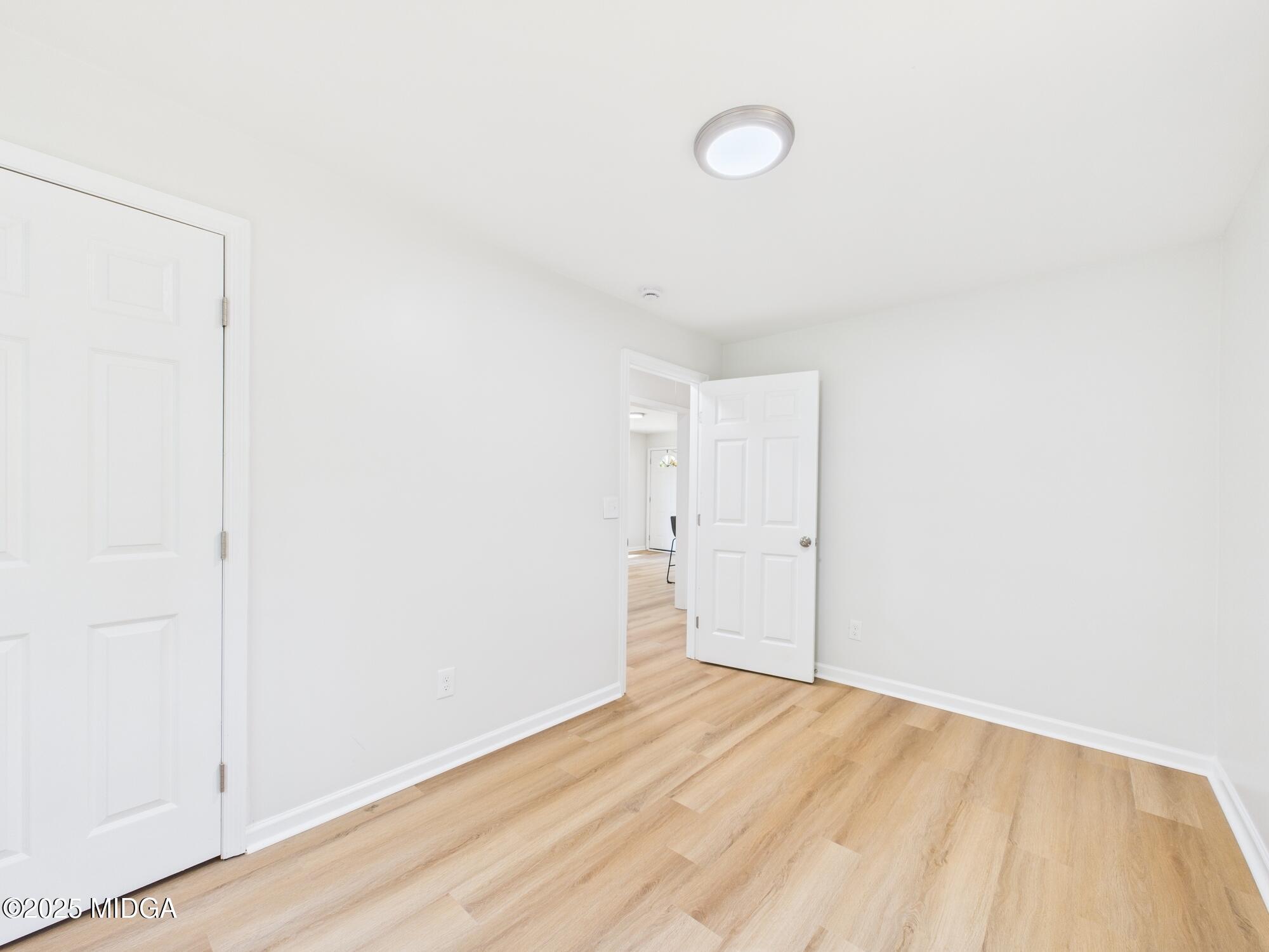 2471 Old Holton Road Macon, GA 31204 - Photo 17 of 34 a view of a room with wooden floor and white walls
