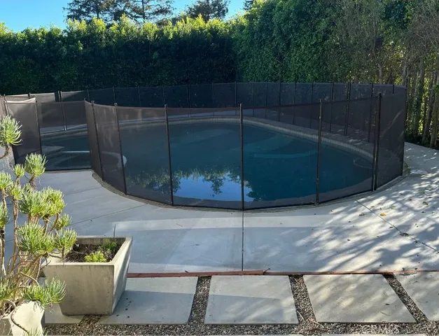 a view of a backyard with plants
