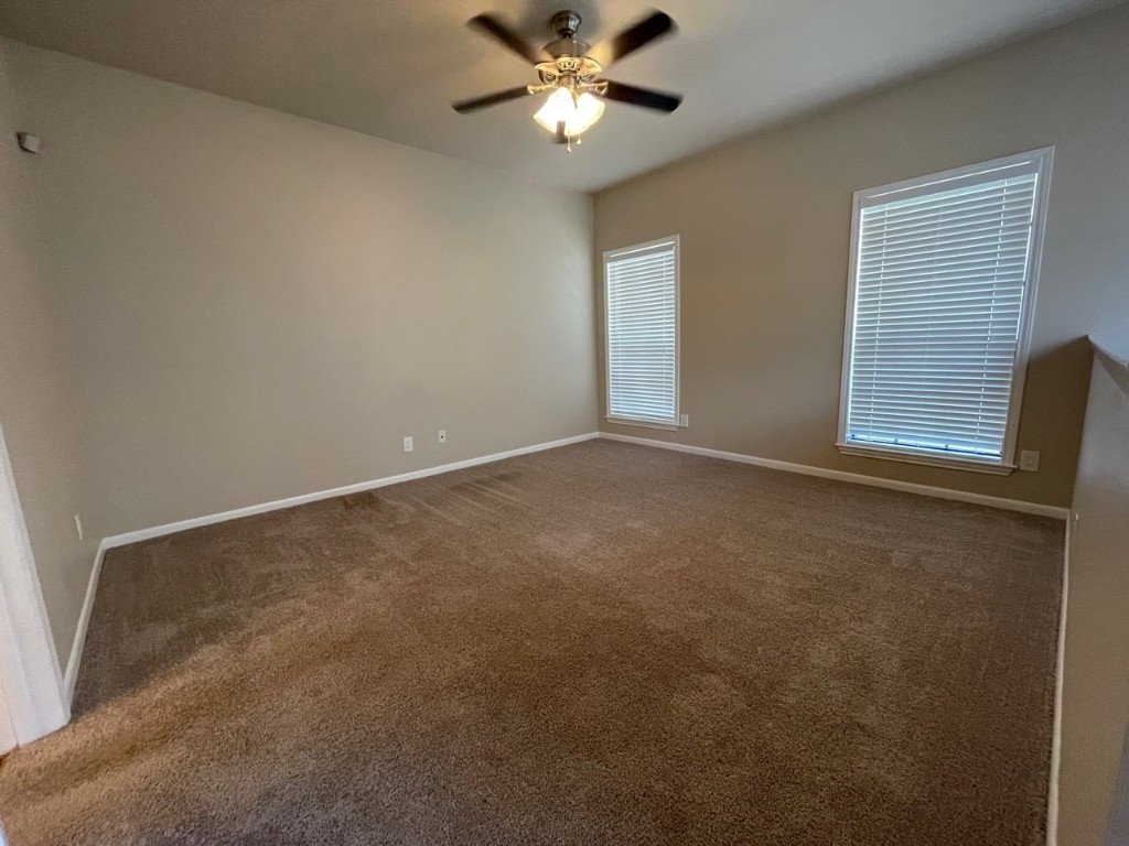 715 West 22 1/2 Street, Unit 201 Austin, TX 78705 - Photo 11 of 15 a view of an empty room with a window