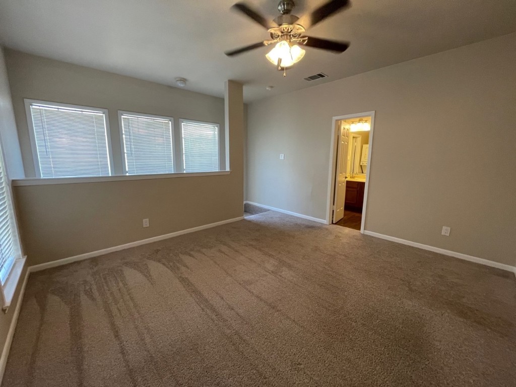 715 West 22 1/2 Street, Unit 201 Austin, TX 78705 - Photo 12 of 15 a view of an empty room with a window
