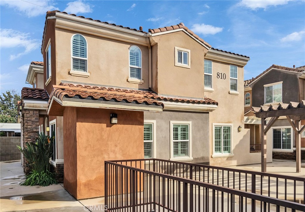 front view of a house with a small yard