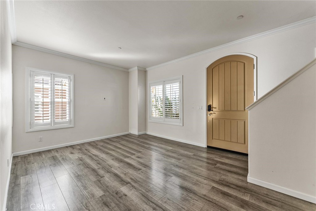 810 North Garfield Avenue Alhambra, CA 91801 - Photo 4 of 26 wooden floor in an empty room with a window