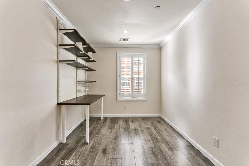 810 North Garfield Avenue Alhambra, CA 91801 - Photo 5 of 26 wooden floor in an empty room with a window