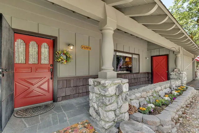 a view of a hallway to a livingroom