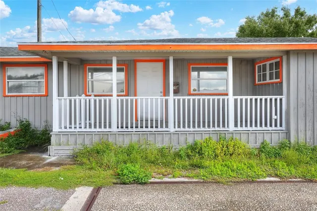 a view of front of house with a yard