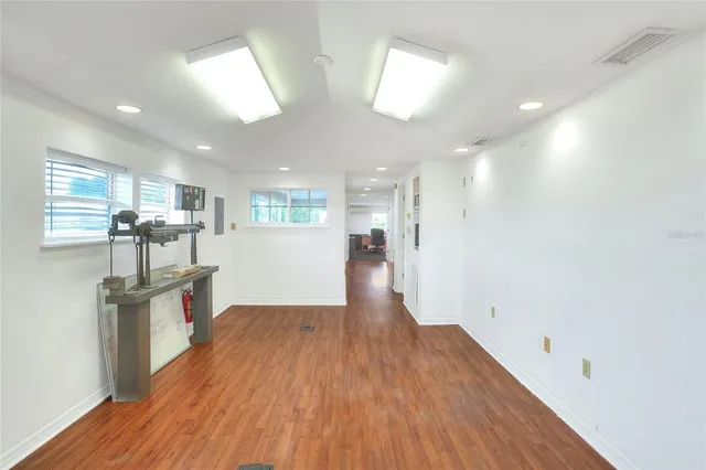 a bathroom with a sink toilet and mirror