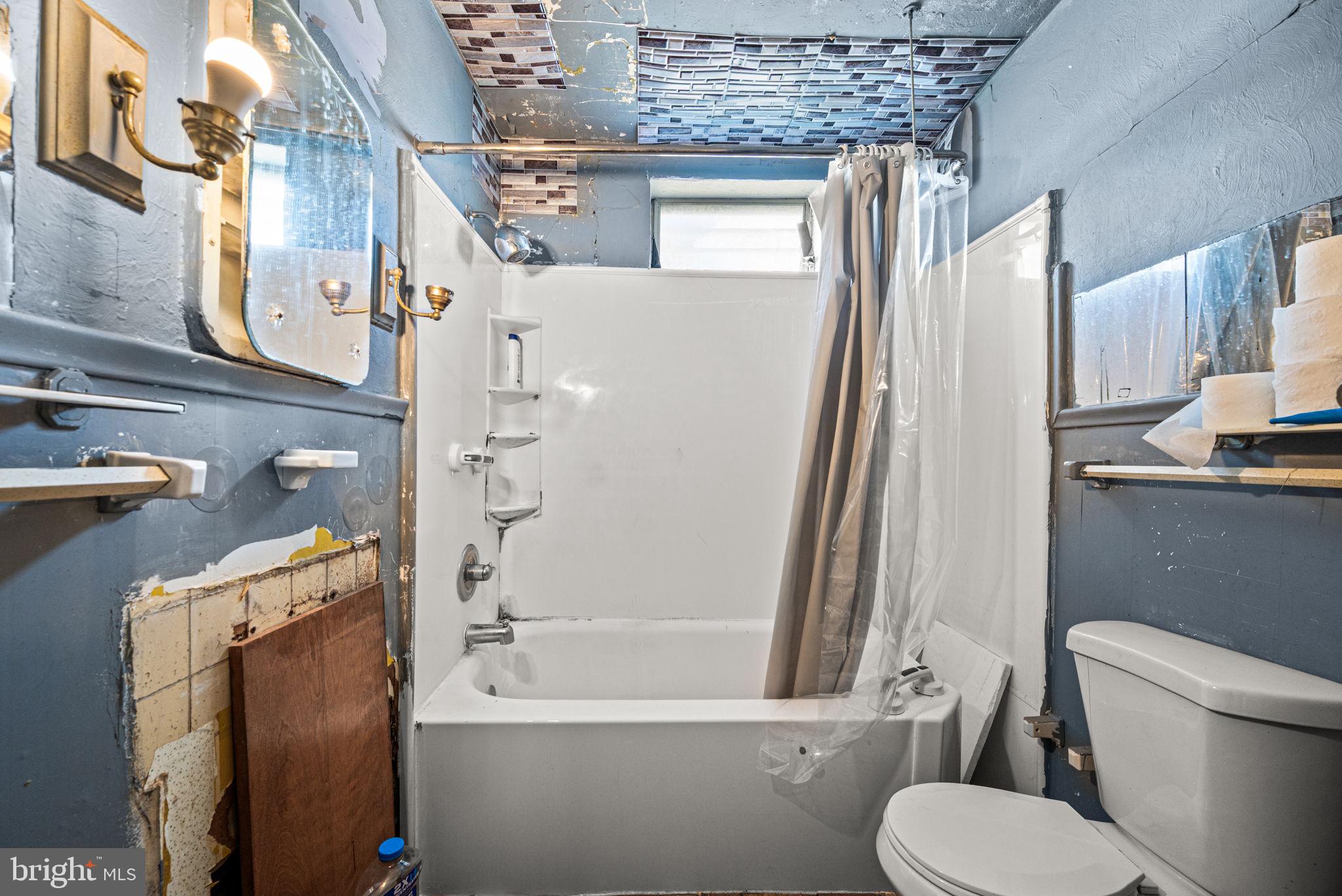 102 West Cliveden Street Philadelphia, PA 19119 - Photo 13 of 25 a bathroom with a toilet a sink and a bathtub