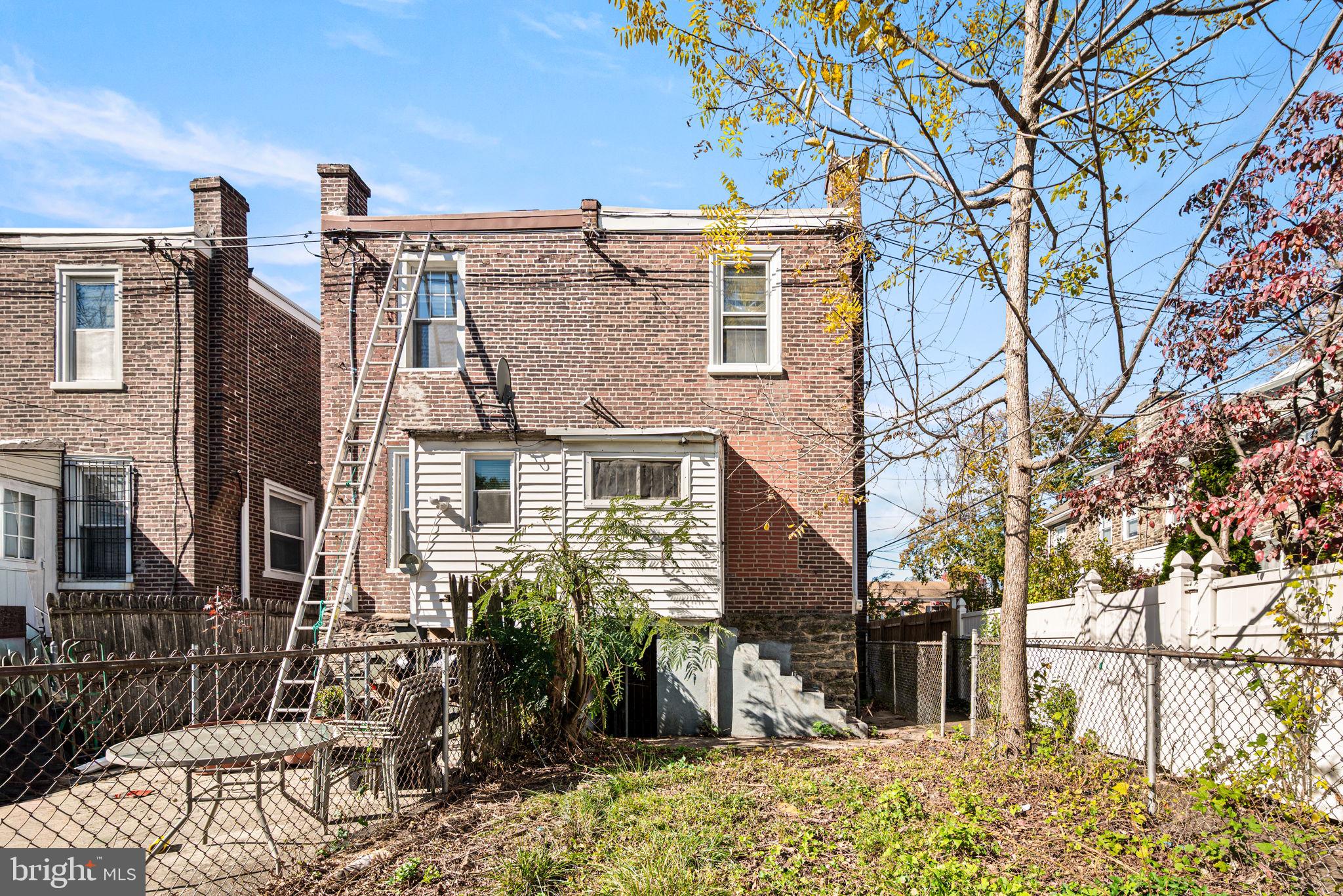102 West Cliveden Street Philadelphia, PA 19119 - Photo 21 of 25 front view of a house with a yard