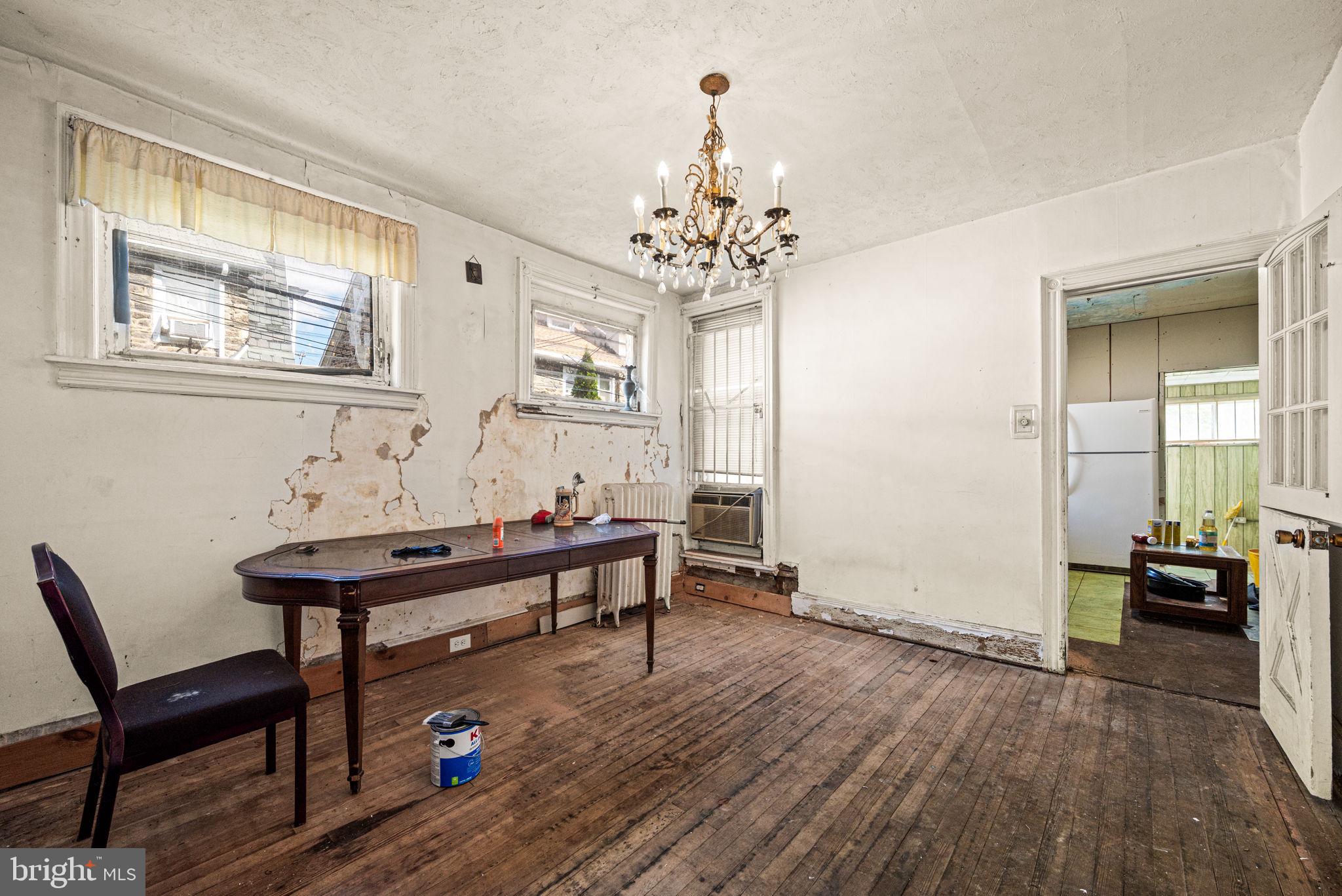 102 West Cliveden Street Philadelphia, PA 19119 - Photo 7 of 25 a view of a livingroom with furniture and window