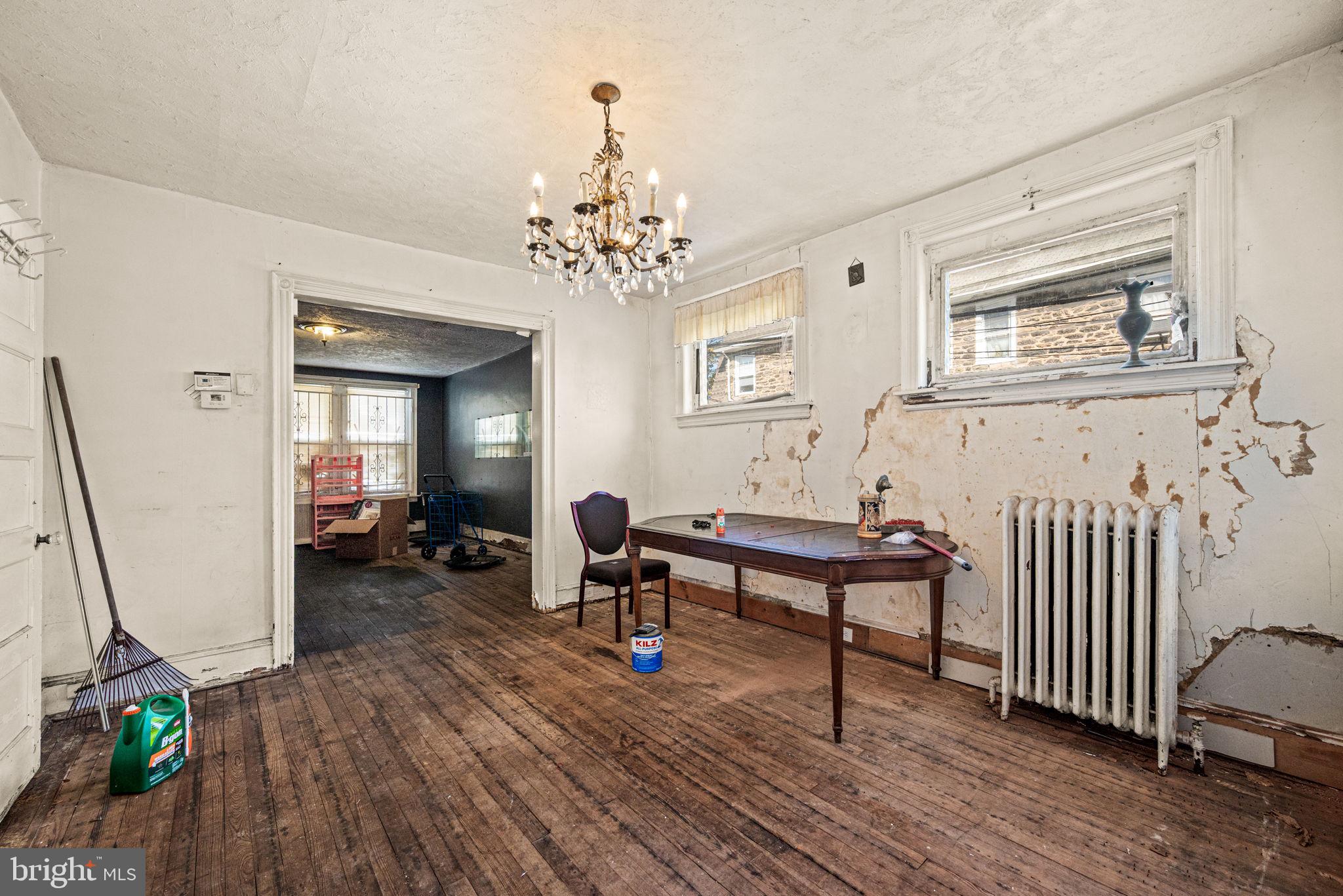 102 West Cliveden Street Philadelphia, PA 19119 - Photo 8 of 25 a living room with furniture and a chandelier
