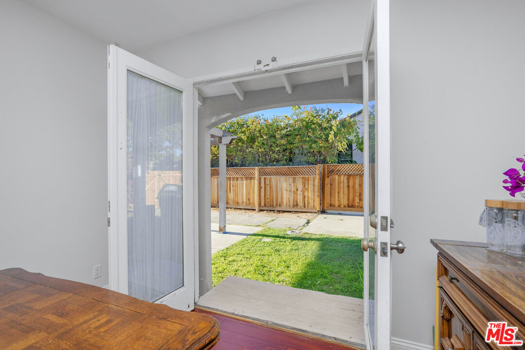 3701 Tilden Avenue Los Angeles, CA 90034 - Photo 13 of 29 a view of a porch with a yard