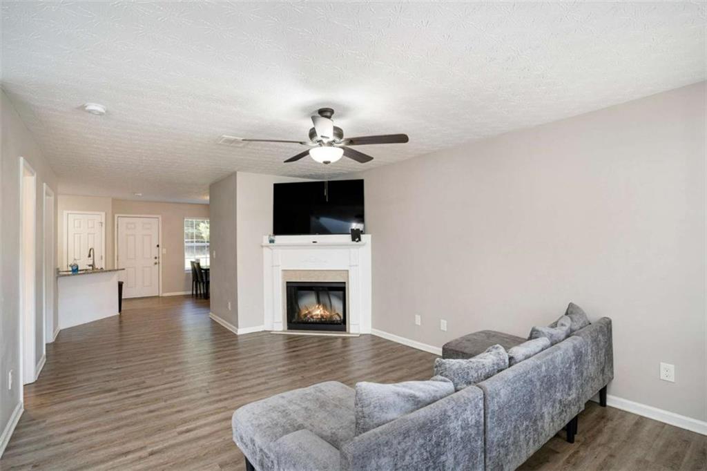1120 Labonte Parkway McDonough, GA 30253 - Photo 6 of 22 a living room with furniture and a fireplace