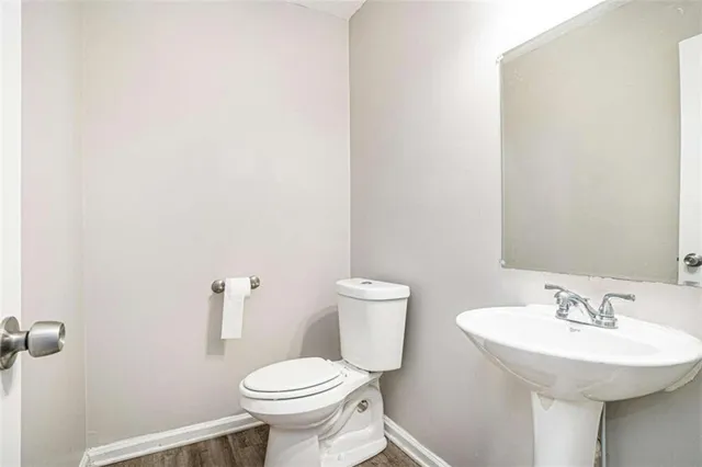 a bathroom with a sink and a toilet