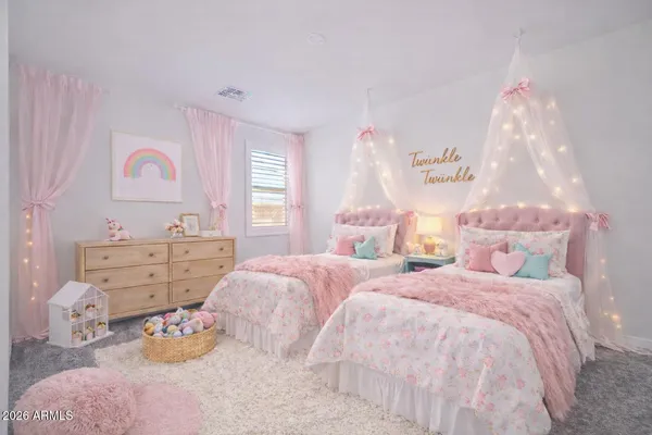 a bedroom with bed and a window