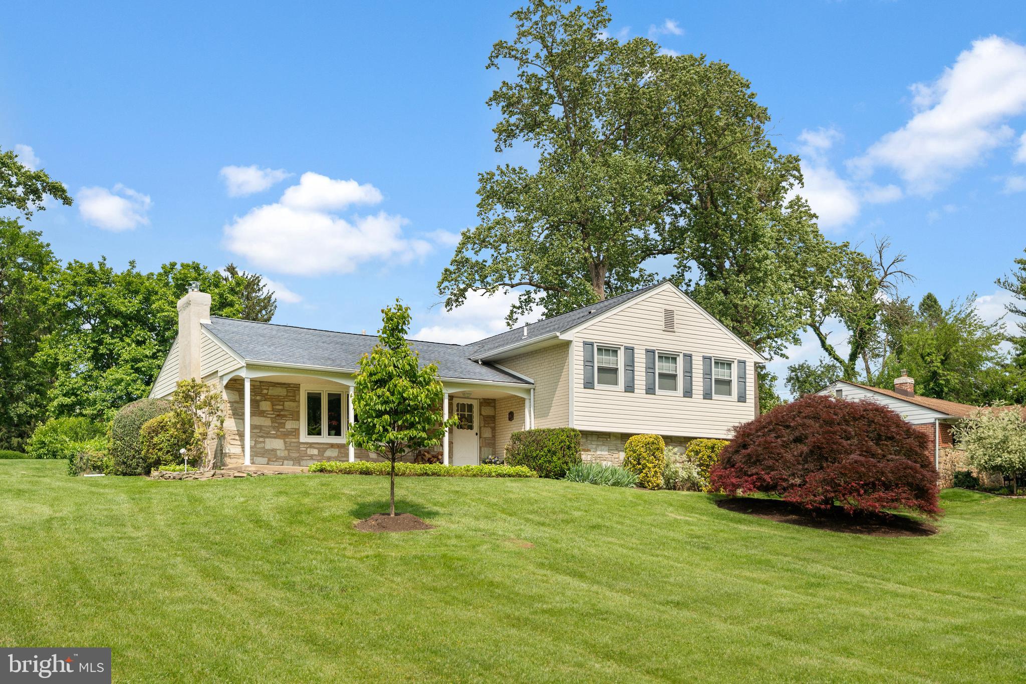 1131 Frederick Road Jenkintown, PA 19046 - Photo 1 of 30 a front view of a house with a garden