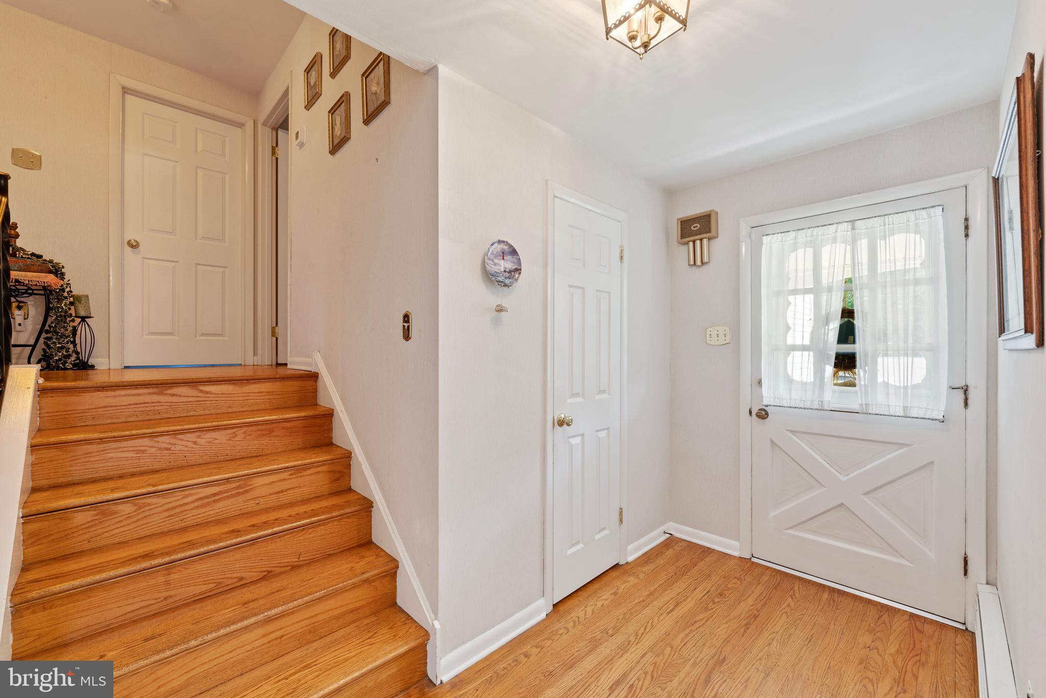 1131 Frederick Road Jenkintown, PA 19046 - Photo 12 of 30 a view of a hallway with wooden floor and entryway