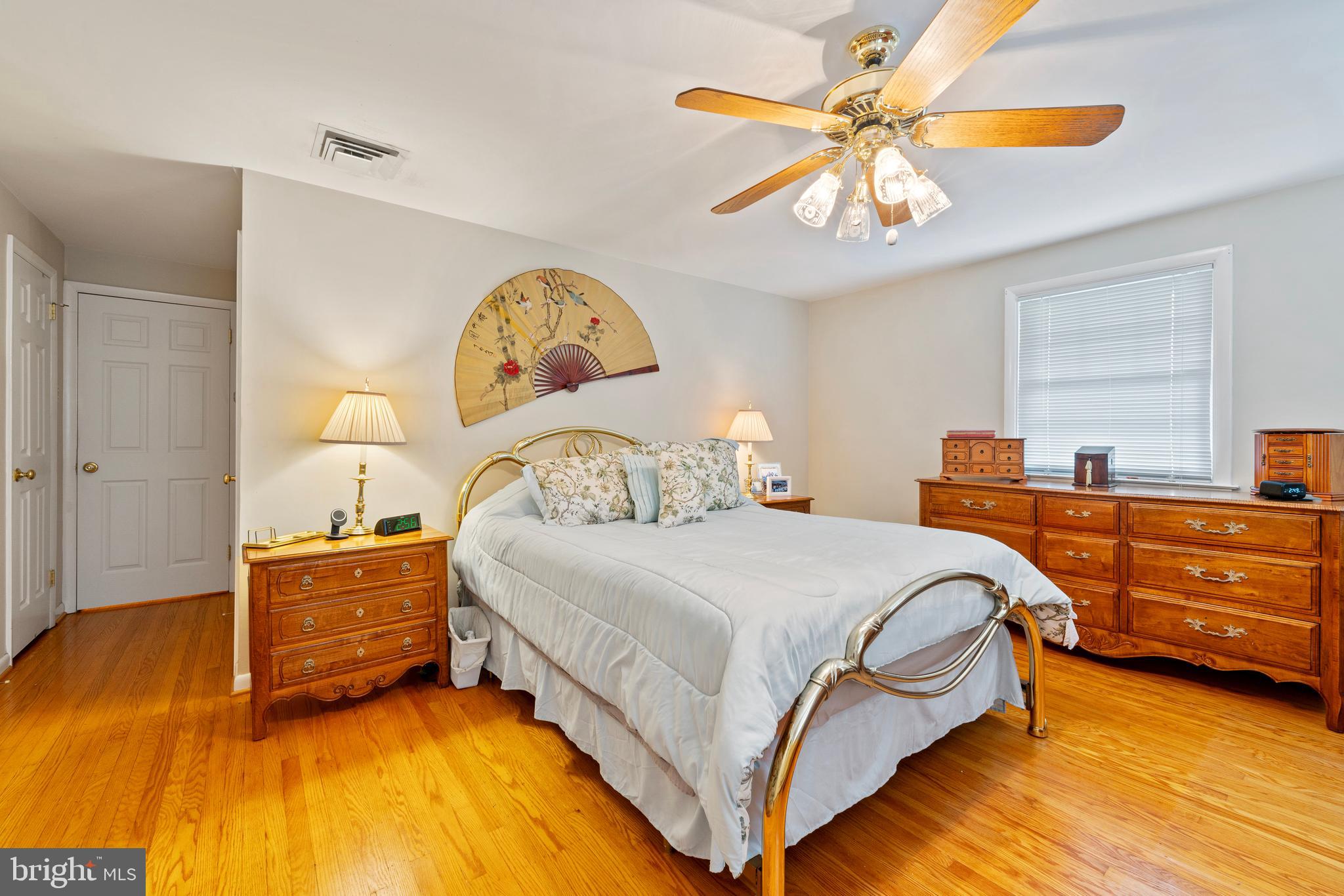1131 Frederick Road Jenkintown, PA 19046 - Photo 14 of 30 a bedroom with a bed and a chandelier