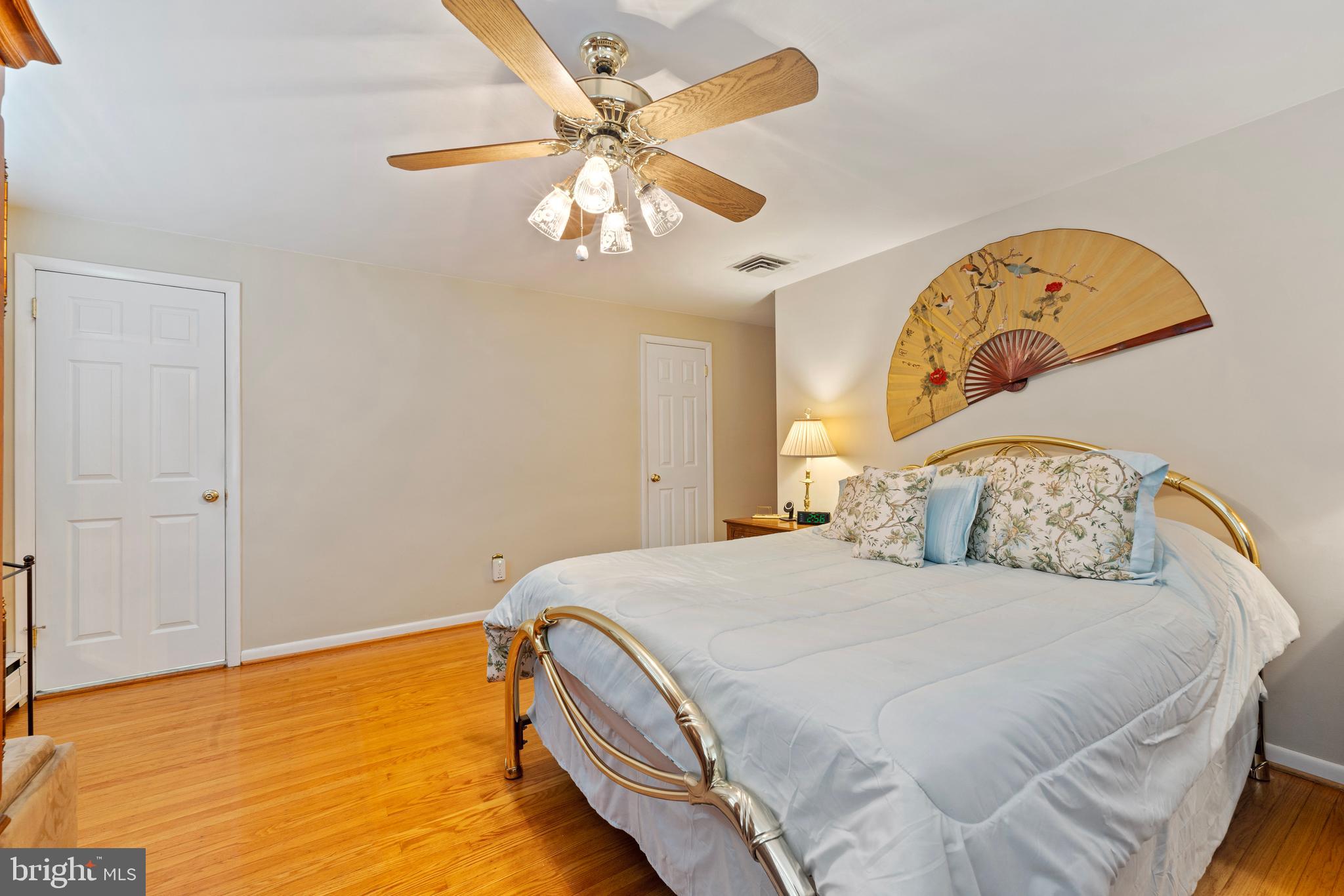 1131 Frederick Road Jenkintown, PA 19046 - Photo 15 of 30 a bedroom with a bed and a chandelier