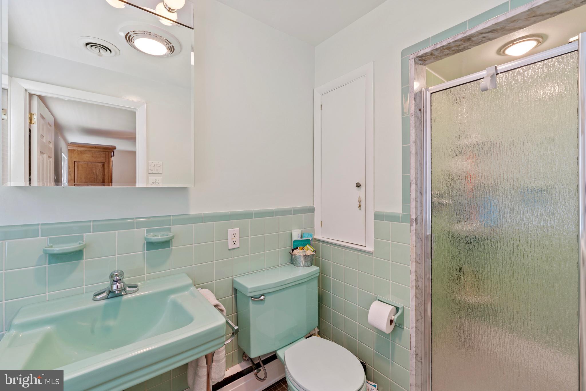 1131 Frederick Road Jenkintown, PA 19046 - Photo 16 of 30 a bathroom with a sink toilet and shower