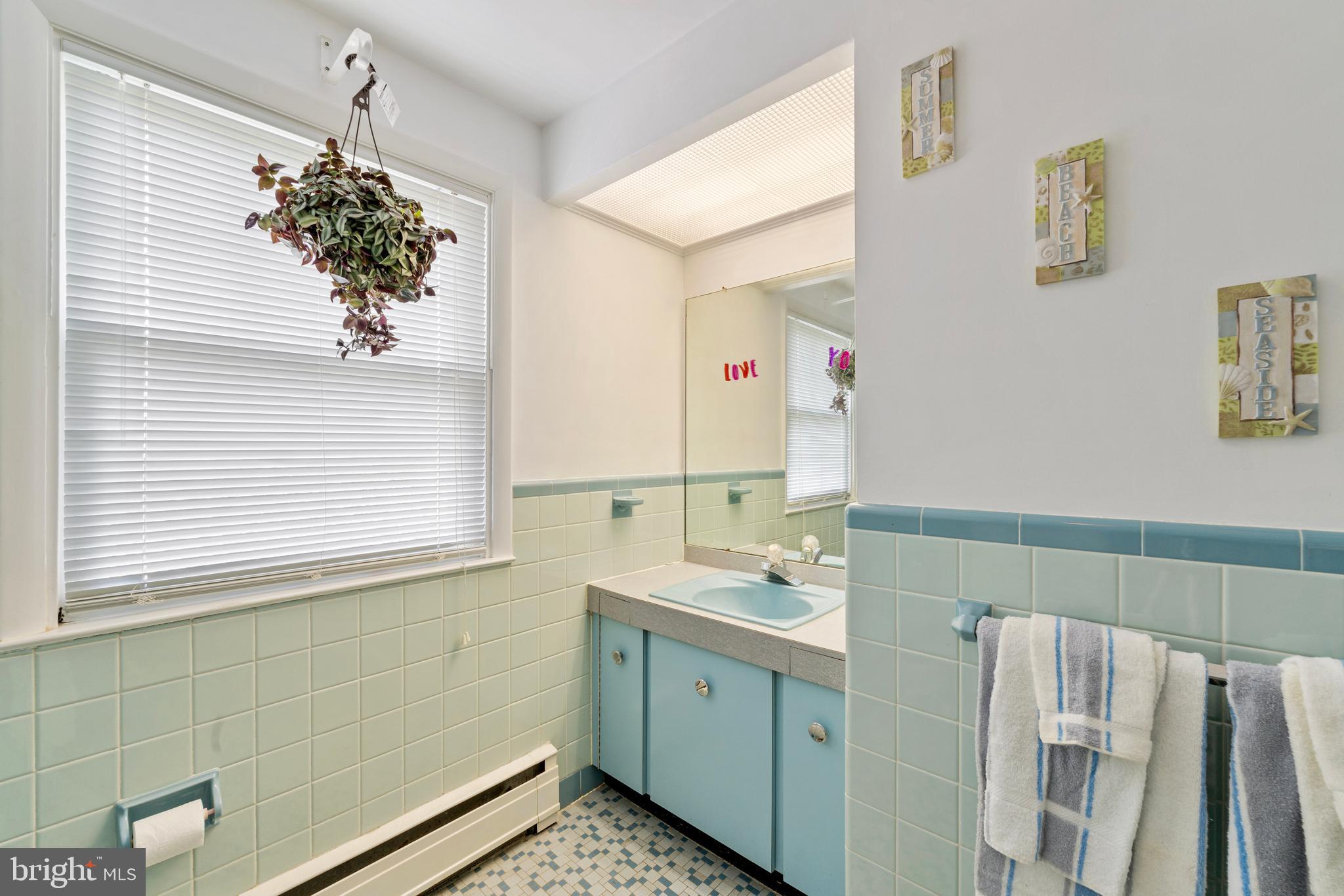 1131 Frederick Road Jenkintown, PA 19046 - Photo 23 of 30 a bathroom with a sink and a mirror