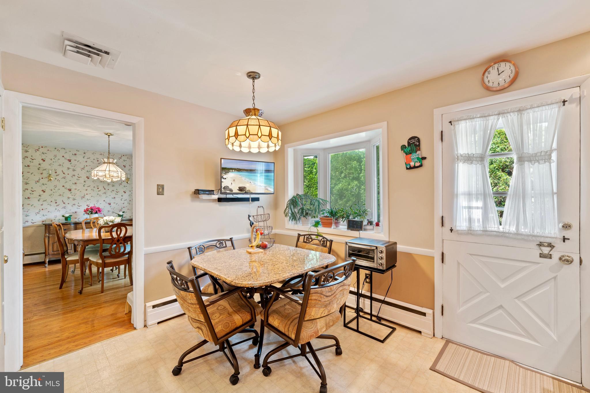 1131 Frederick Road Jenkintown, PA 19046 - Photo 9 of 30 a view of a dining room with furniture window and outside view