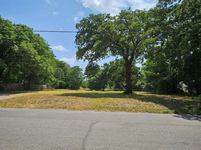 a view of a yard with an outdoor space