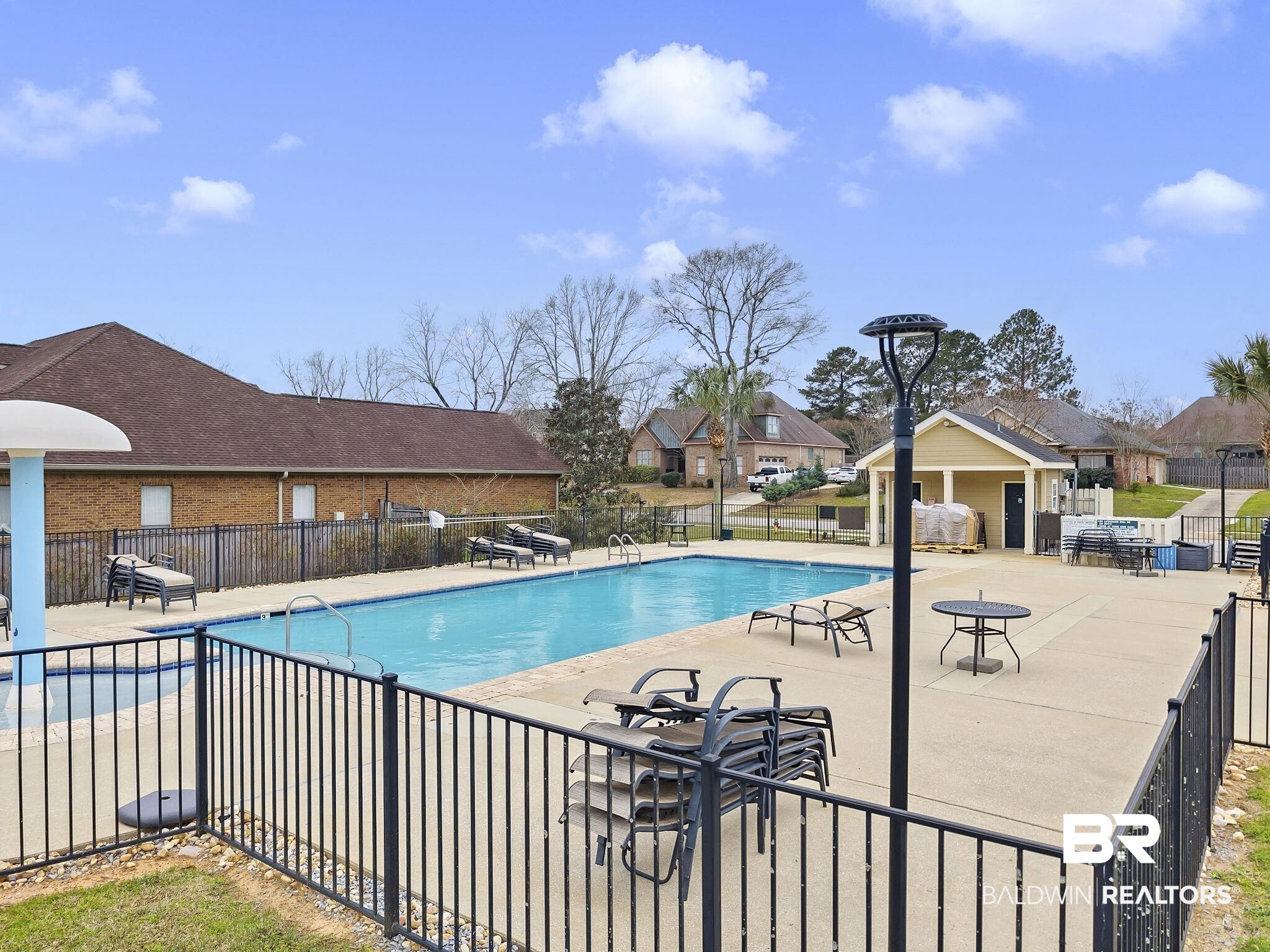 11247 Thistledown Loop Spanish Fort, AL 36527 - Photo 58 of 72 Pool with a patio and fence