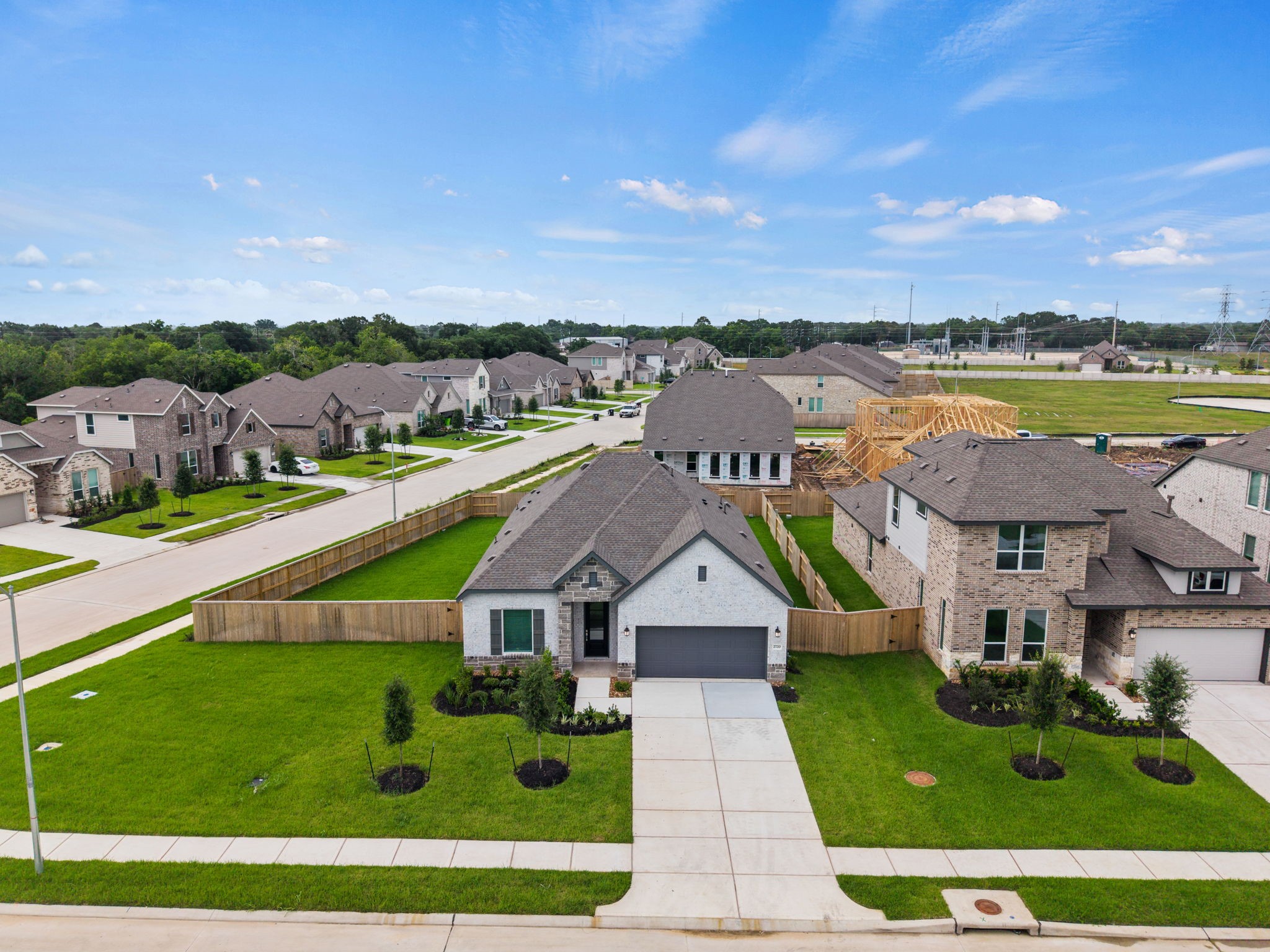 2720 Grove Crest Drive Rosenberg, TX 77469 - Photo 4 of 32 Aerial view highlighting the home's oversized lot, expansive backyard, and prime position within a beautifully planned community.