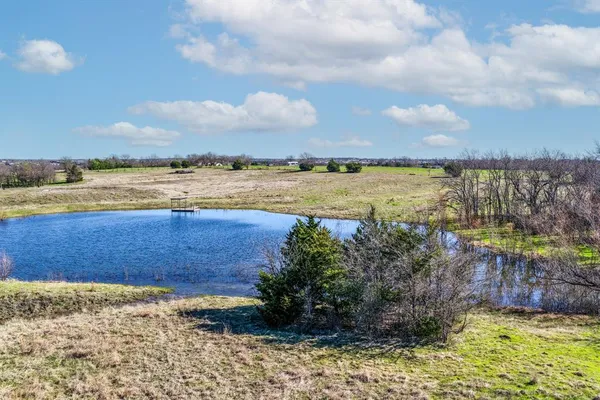 a view of a lake with outdoor space