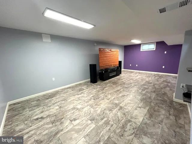 a view of a livingroom with a flat screen tv