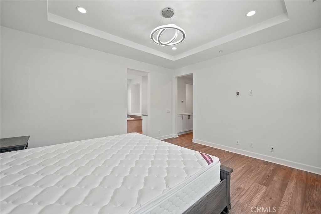 77 English Saddle Irvine, CA 92602 - Photo 24 of 35 a bedroom with a bed and a window