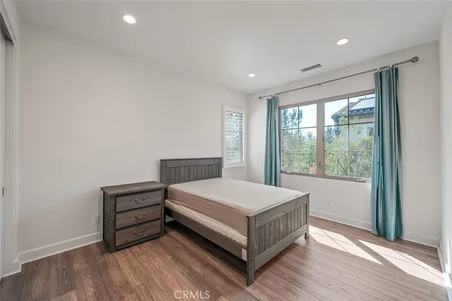 a view of cabinets with wooden floor