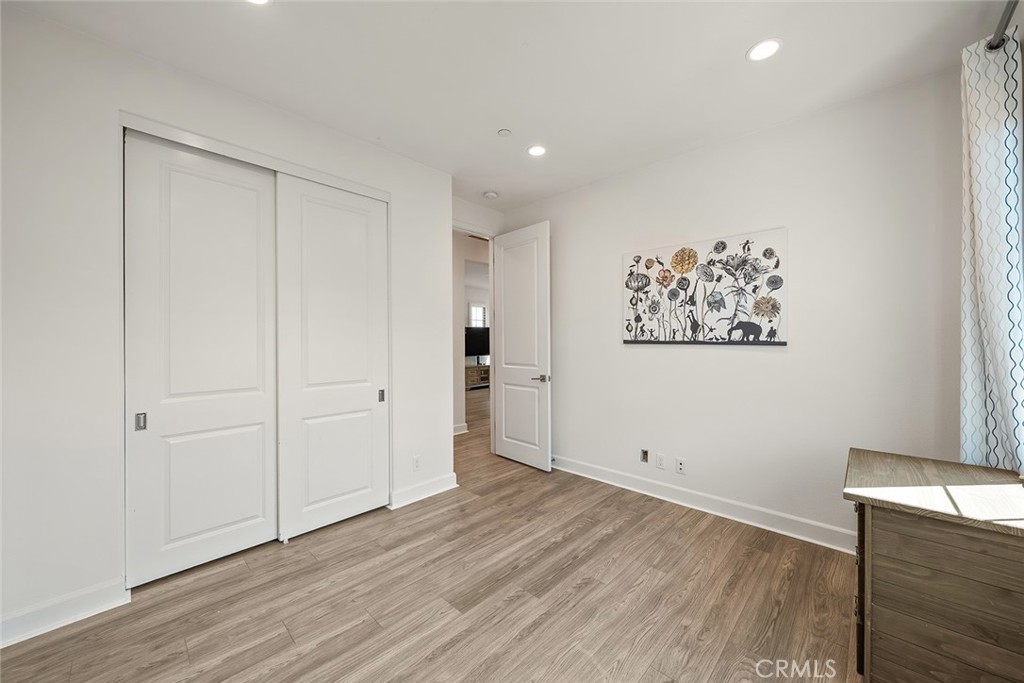 77 English Saddle Irvine, CA 92602 - Photo 33 of 35 a view of a room with wooden floor
