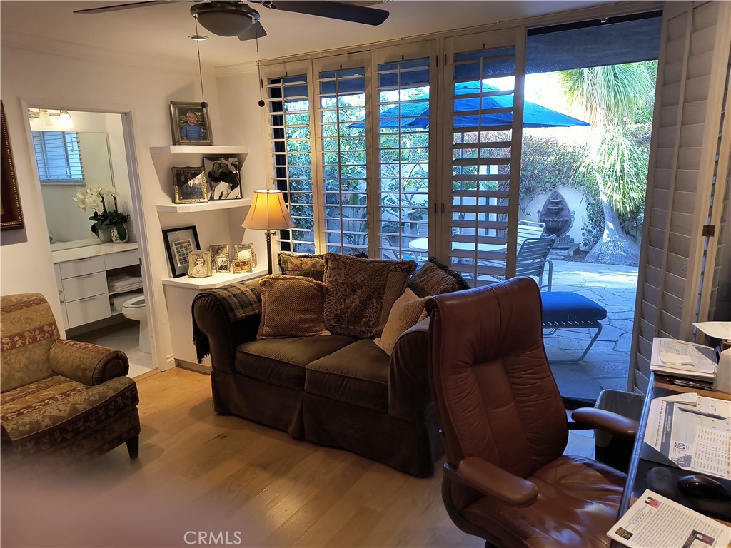 6 Whittier Court Rancho Mirage, CA 92270 - Photo 15 of 74 a living room with furniture and a large window