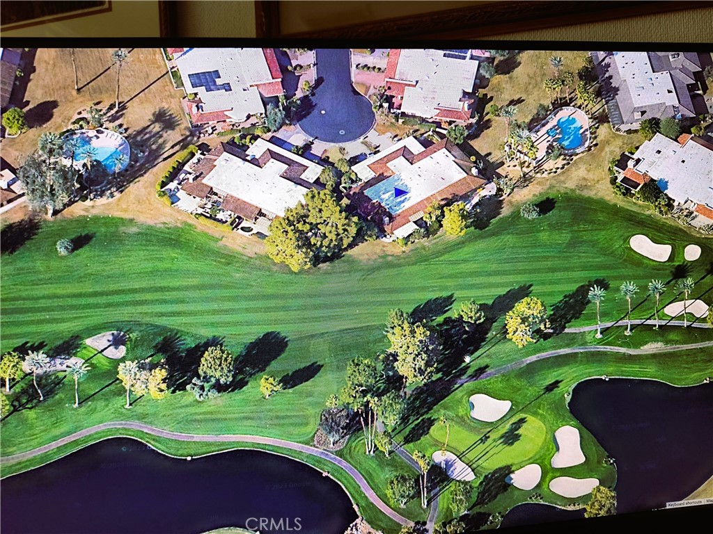6 Whittier Court Rancho Mirage, CA 92270 - Photo 5 of 74 a view of a play ground with an outdoor space