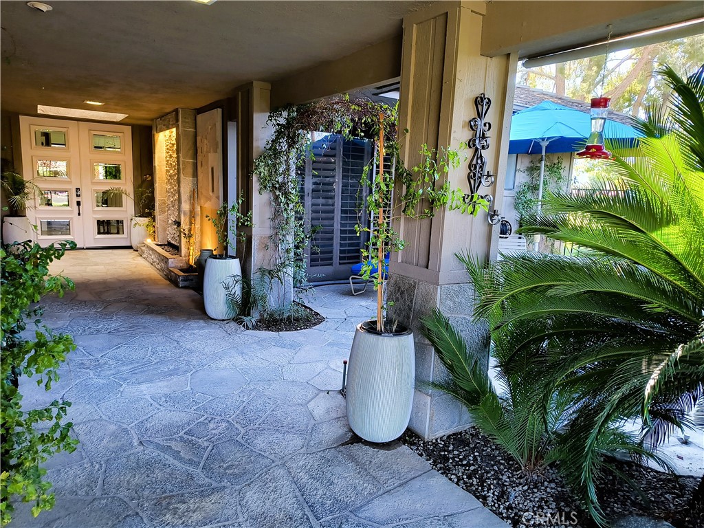 6 Whittier Court Rancho Mirage, CA 92270 - Photo 6 of 70 ENTRANCE FOYER W/ WALL FOUNTAIN